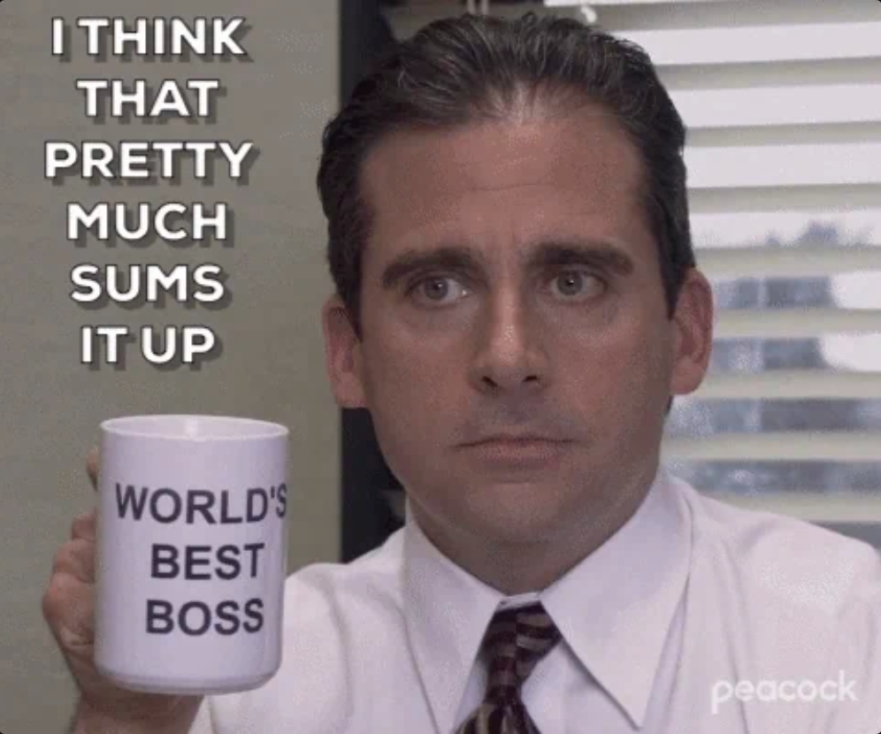 Steve Carell from The Office holding mug that says "World's best boss"