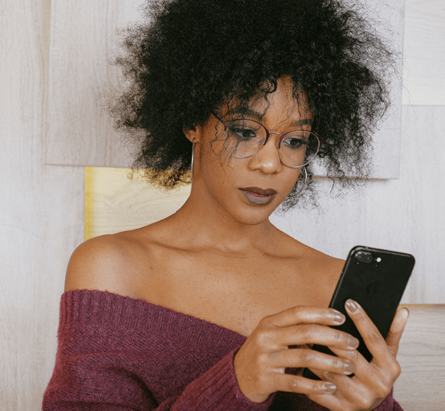 Black woman texting