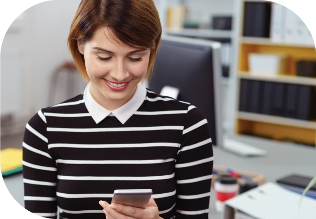 Business woman uses SMS opt in on her mobile device