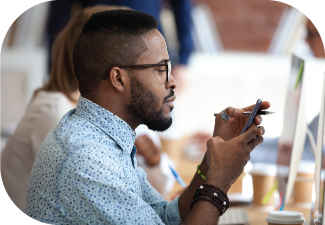 Businessman uses SMS opt in on his mobile device